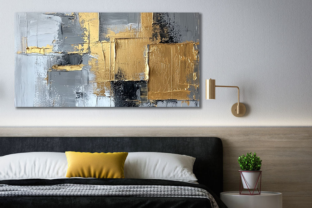 Bedroom interior featuring golden abstract painting on natural canvas