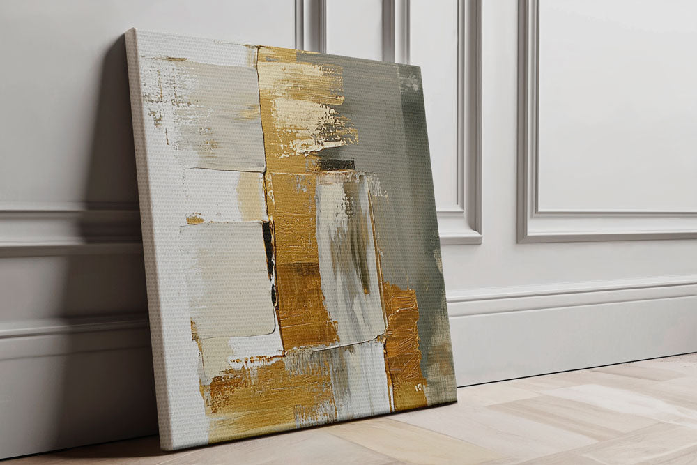 Side view of golden abstract square painting on canvas with glossy details