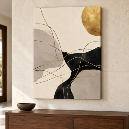 Canvas print with gold-toned varnish line details displayed above a sideboard in an entryway