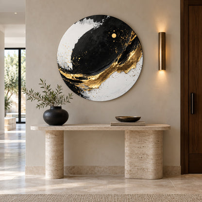 Round aluminium print with gold accents displayed in a luxury entryway
