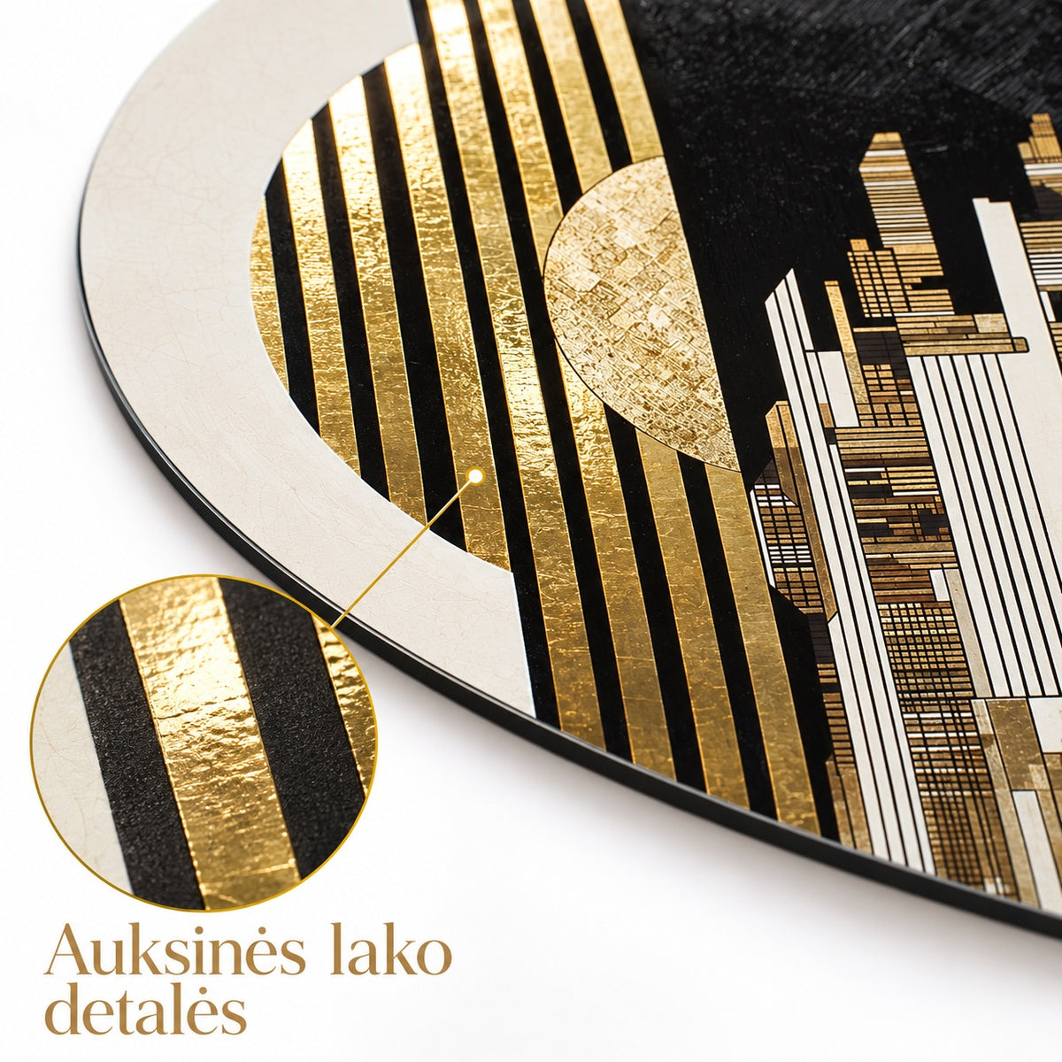 Close-up of gold-toned gloss varnish details on the round aluminium print, with LT callout text 'Auksinès lako detalès'