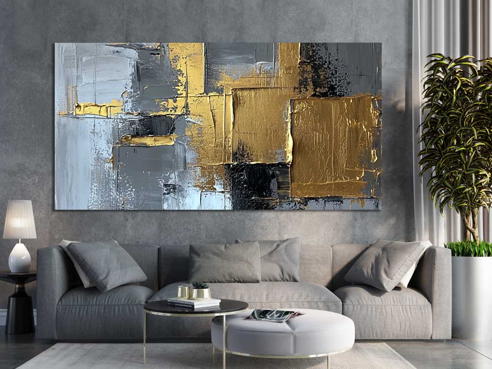 Modern living room with abstract gold and grey canvas wall art