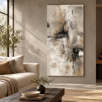Canvas print with charcoal, taupe, and ivory brushstrokes displayed above a cream sofa in a living room