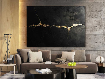 Golden Crack canvas wall art with black background and golden crack in industrial style room