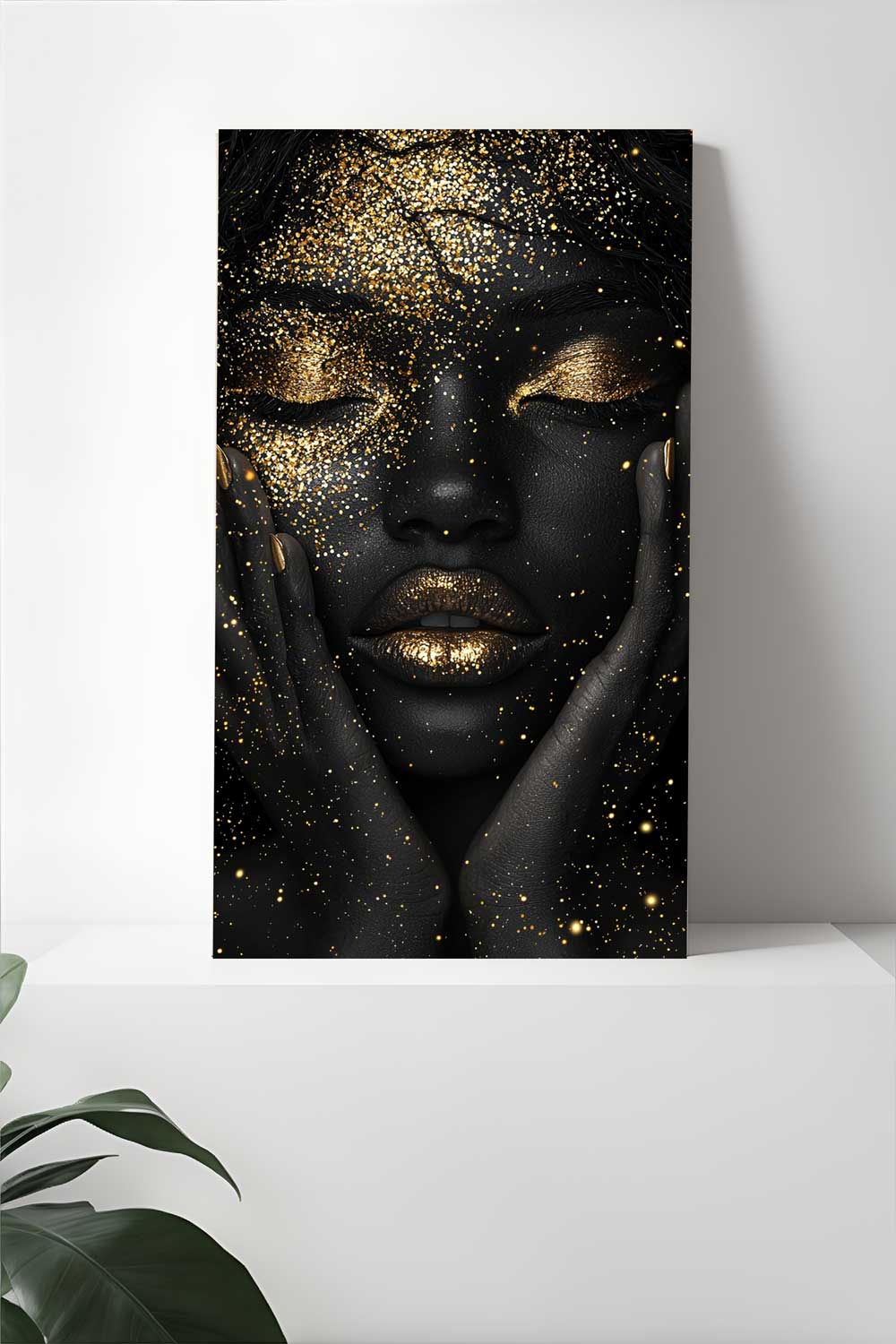 Shimmering black and gold face artwork with closed eyes on canvas