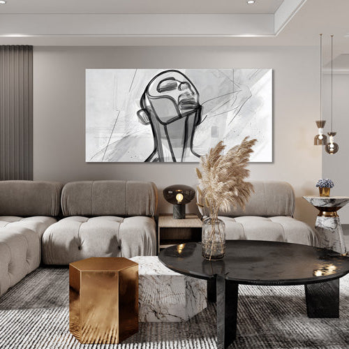 Lines of Thought canvas print hanging above a beige sectional sofa and black round coffee table, with a gold accent stool