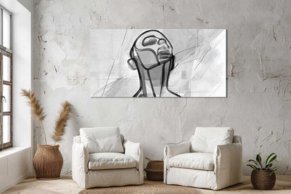 Lines of Thought canvas print displayed on a textured plaster wall above two white cushioned armchairs, with pampas grass and a potted plant