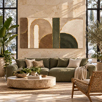 Canvas print of abstract arched forms displayed above a sofa in a sunlit living room with stone walls