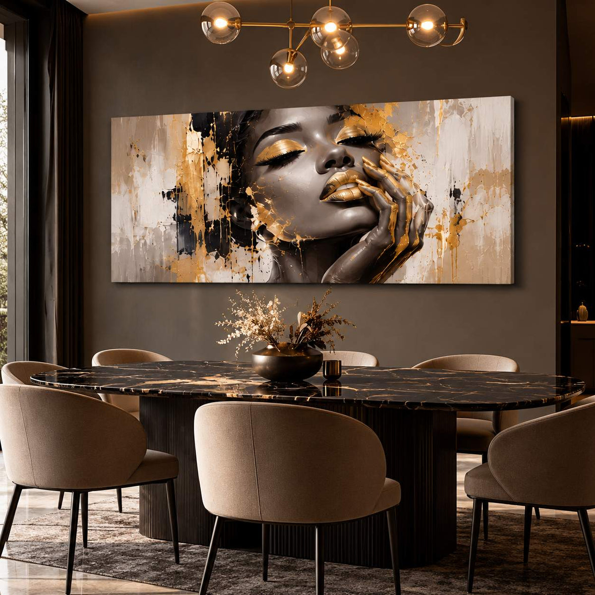 Monochrome gold-accent portrait canvas print displayed above a dining table beneath a modern chandelier
