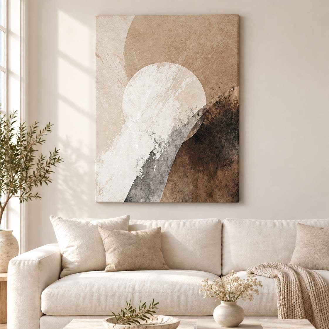 Quiet Horizon canvas print displayed above a cream sofa in a bright living room