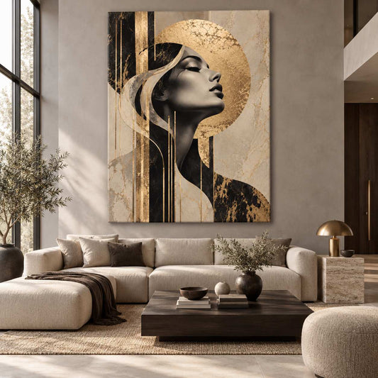 Abstract gold and black portrait canvas print displayed above a beige sectional sofa in a bright living room